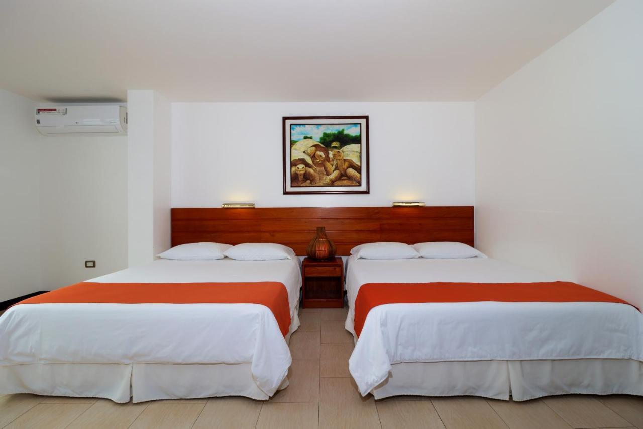 Galapagos Apartments - Bay View House ปูแอร์โตอาโยรา ภายนอก รูปภาพ